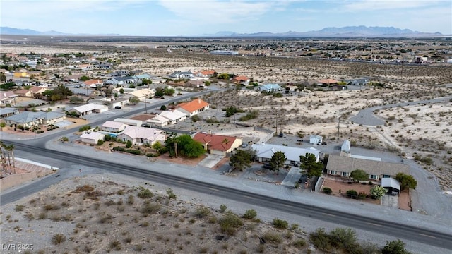 3481 Winery Rd, Pahrump, NV 89048 - aerial perspective of suburban area featuring mountains and a desert landscape