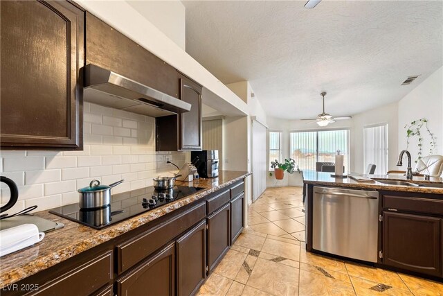 3481 Winery Rd, Pahrump, NV 89048 - kitchen featuring stainless steel dishwasher, a sink, black electric stovetop, wall chimney range hood, and tasteful backsplash