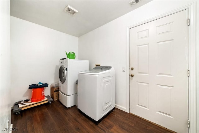 3481 Winery Rd, Pahrump, NV 89048 - washroom with separate washer and dryer and dark wood-style flooring
