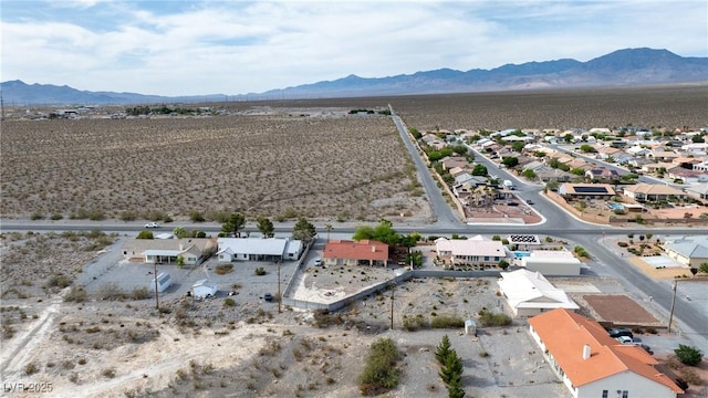3481 Winery Rd, Pahrump, NV 89048 - aerial view of residential area with mountains and a desert landscape