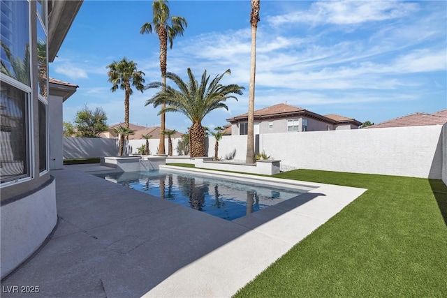 view of swimming pool featuring a patio area and a pool with connected hot tub