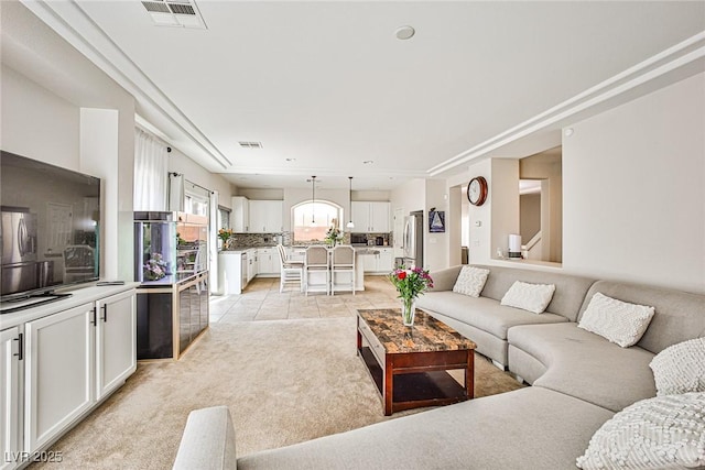 6409 Shawnee Springs Ct, Las Vegas, NV 89139 - living room with light carpet, light tile patterned floors, and recessed lighting