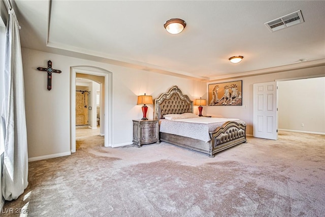 6409 Shawnee Springs Ct, Las Vegas, NV 89139 - bedroom featuring carpet floors, arched walkways, and baseboards