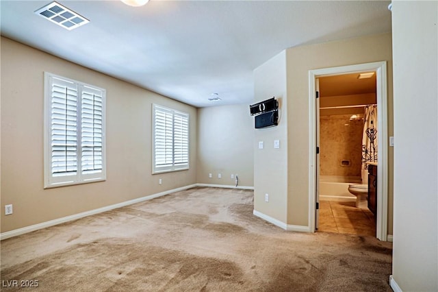 6409 Shawnee Springs Ct, Las Vegas, NV 89139 - unfurnished bedroom featuring carpet, baseboards, and connected bathroom