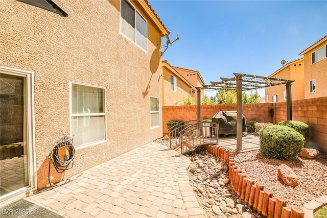 6409 Shawnee Springs Ct, Las Vegas, NV 89139 - view of patio / terrace featuring a fenced backyard, area for grilling, and a pergola