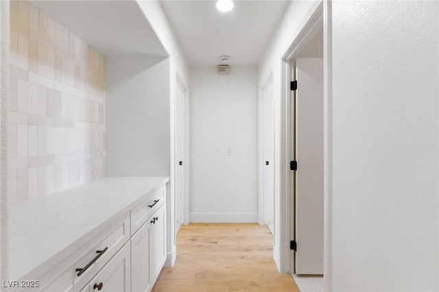 2913 Hawksdale Dr, Las Vegas, NV 89134 - corridor with light wood-style floors and baseboards