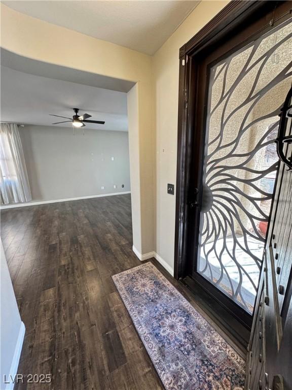 3938 E Chaffe Ave, Pahrump, NV 89061 - foyer featuring wood finished floors, baseboards, and ceiling fan