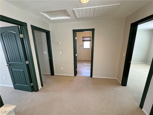 3938 E Chaffe Ave, Pahrump, NV 89061 - unfurnished bedroom with carpet flooring, baseboards, and attic access