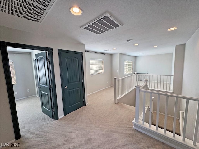 3938 E Chaffe Ave, Pahrump, NV 89061 - hall featuring an upstairs landing, carpet floors, recessed lighting, and baseboards