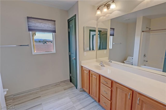 3938 E Chaffe Ave, Pahrump, NV 89061 - bathroom featuring toilet, vanity, and shower / tub combination