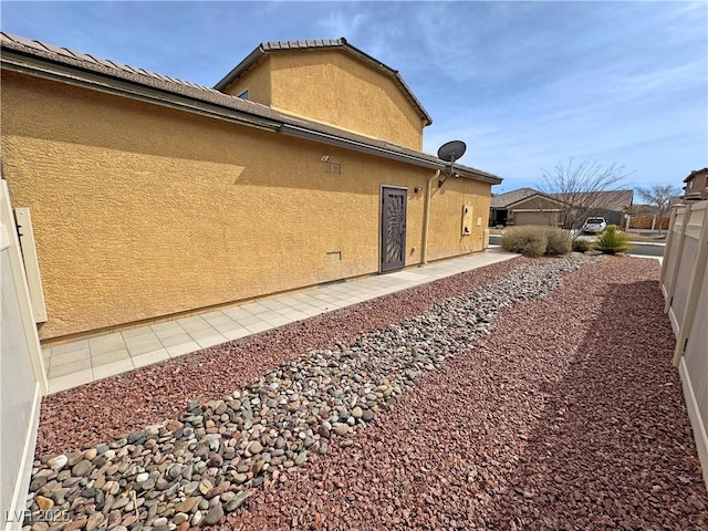 3938 E Chaffe Ave, Pahrump, NV 89061 - view of home's exterior with stucco siding and fence
