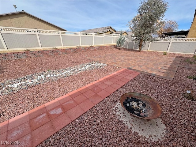 3938 E Chaffe Ave, Pahrump, NV 89061 - fenced backyard featuring a patio area