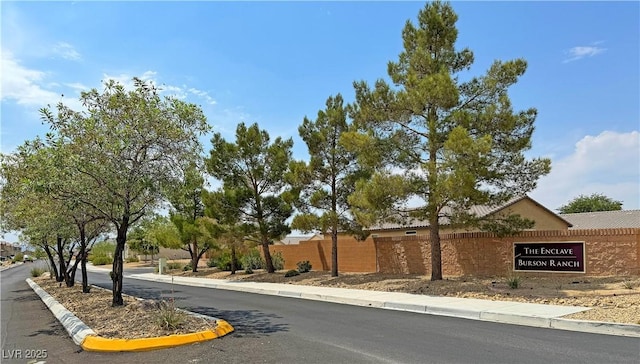 3938 E Chaffe Ave, Pahrump, NV 89061 - view of asphalt road featuring sidewalks and curbs