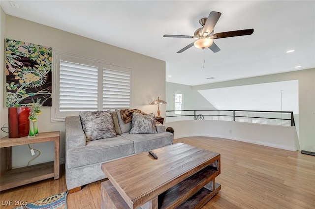 8591 Heather Downs Dr, Las Vegas, NV 89113 - living area featuring ceiling fan, wood finished floors, baseboards, and recessed lighting