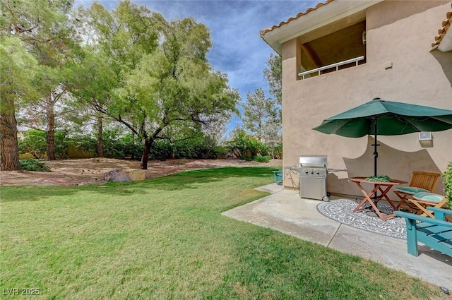 8591 Heather Downs Dr, Las Vegas, NV 89113 - view of green lawn featuring a patio area
