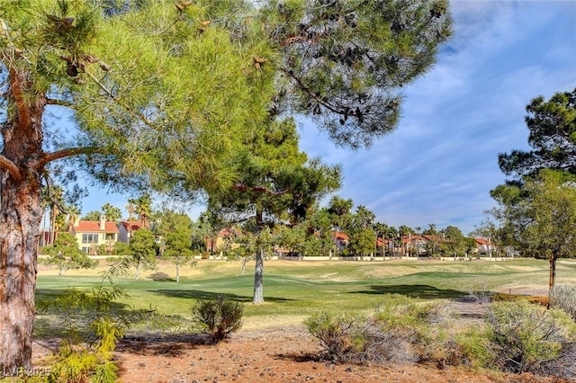 8591 Heather Downs Dr, Las Vegas, NV 89113 - surrounding community featuring a yard and view of golf course
