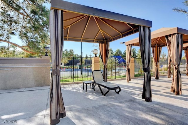 8591 Heather Downs Dr, Las Vegas, NV 89113 - view of property's community featuring a gazebo and fence
