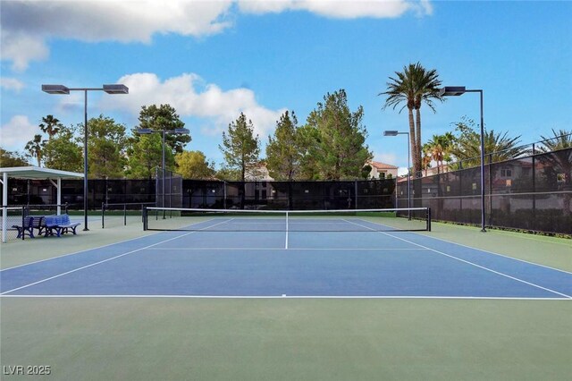 8591 Heather Downs Dr, Las Vegas, NV 89113 - view of tennis court with fence and community basketball court