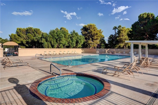 8591 Heather Downs Dr, Las Vegas, NV 89113 - community pool with a patio and a hot tub