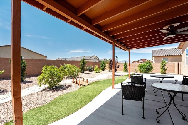 3543 E Malheur Ave, Pahrump, NV 89061 - view of patio featuring a fenced backyard and a ceiling fan