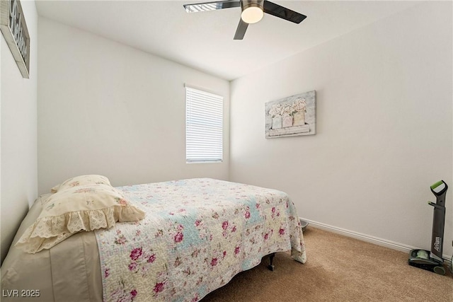 3543 E Malheur Ave, Pahrump, NV 89061 - carpeted bedroom with baseboards and a ceiling fan