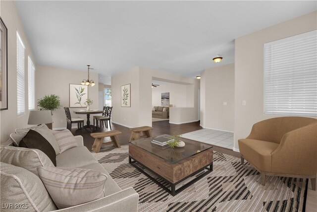 82 Autumn Day St, Henderson, NV 89012 - living area with a chandelier and baseboards