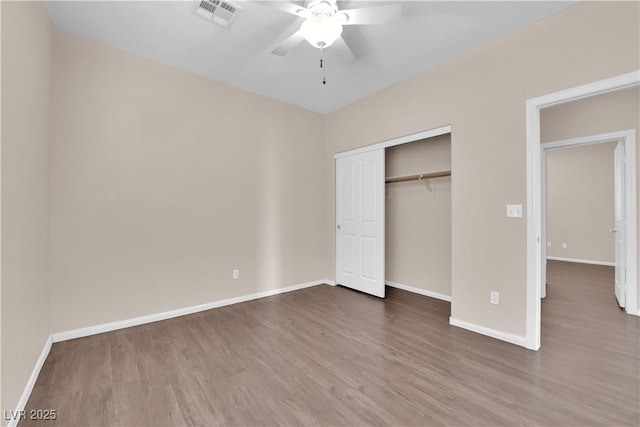 82 Autumn Day St, Henderson, NV 89012 - unfurnished bedroom featuring wood finished floors, baseboards, a closet, and ceiling fan