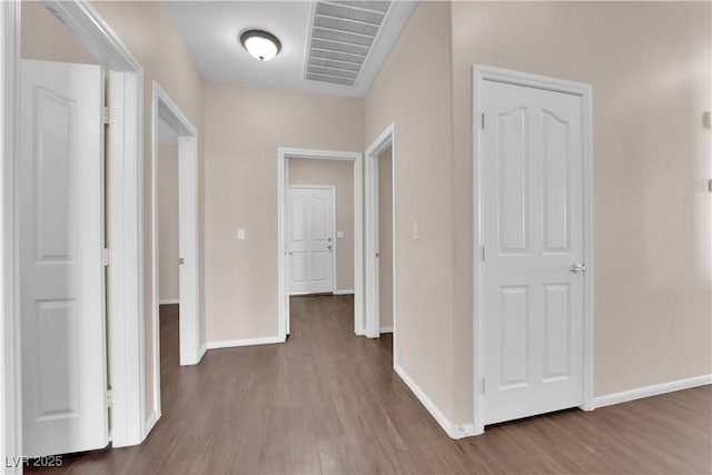 82 Autumn Day St, Henderson, NV 89012 - hallway featuring wood finished floors and baseboards