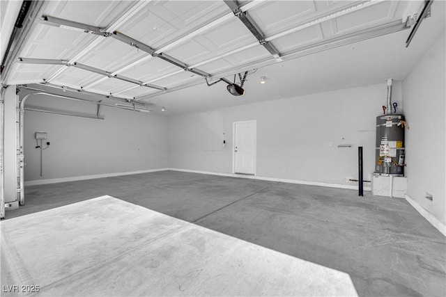 82 Autumn Day St, Henderson, NV 89012 - garage featuring secured water heater, a garage door opener, and baseboards
