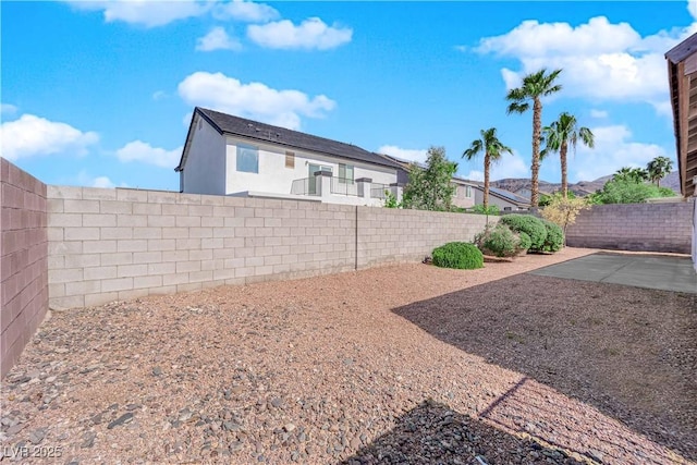 82 Autumn Day St, Henderson, NV 89012 - fenced backyard featuring a patio area