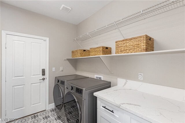 191 Reed Ln, Henderson, NV 89074 - laundry area with washing machine and dryer and baseboards
