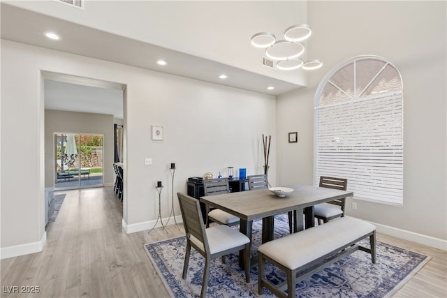 191 Reed Ln, Henderson, NV 89074 - dining space with light wood-style flooring, baseboards, and recessed lighting