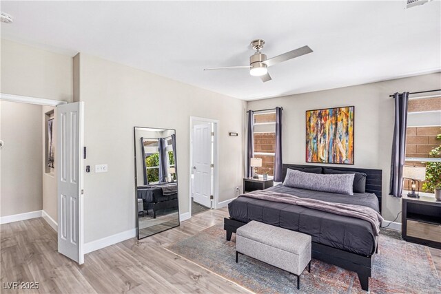 191 Reed Ln, Henderson, NV 89074 - bedroom featuring light wood-type flooring, baseboards, and a ceiling fan