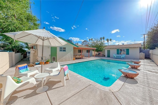 1721 E Oakey Blvd, Las Vegas, NV 89104 - view of swimming pool featuring a patio, a fenced backyard, and an outbuilding