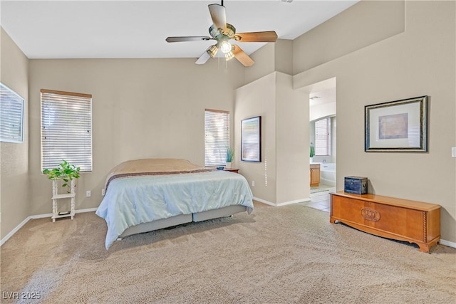 2309 Tedesca Dr, Henderson, NV 89052 - bedroom featuring carpet, baseboards, ensuite bath, and vaulted ceiling