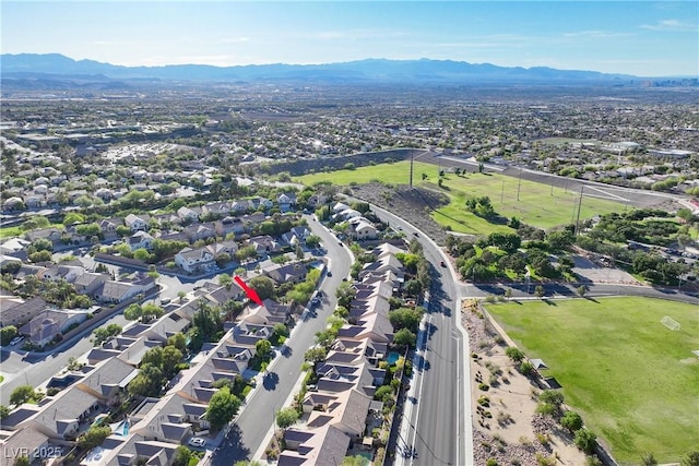 2309 Tedesca Dr, Henderson, NV 89052 - aerial view of property's location featuring a mountain backdrop and nearby suburban area