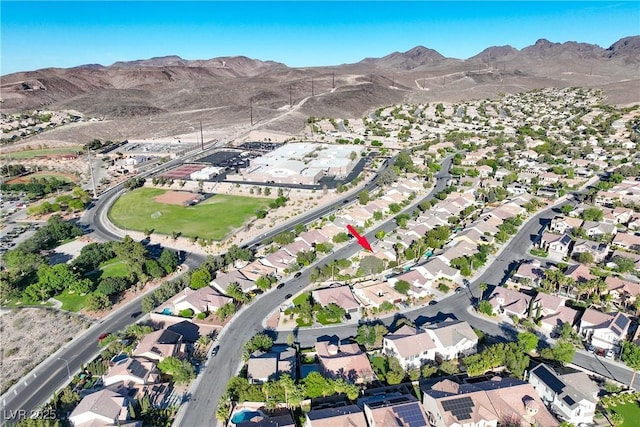 2309 Tedesca Dr, Henderson, NV 89052 - aerial view of property and surrounding area with nearby suburban area and a mountain backdrop
