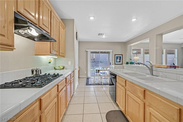 2309 Tedesca Dr, Henderson, NV 89052 - kitchen featuring tile counters, under cabinet range hood, black appliances, a sink, and recessed lighting