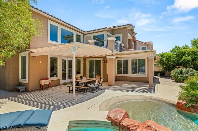 2940 Cimini Ct, Henderson, NV 89052 - back of house featuring a pergola, stucco siding, french doors, and a patio