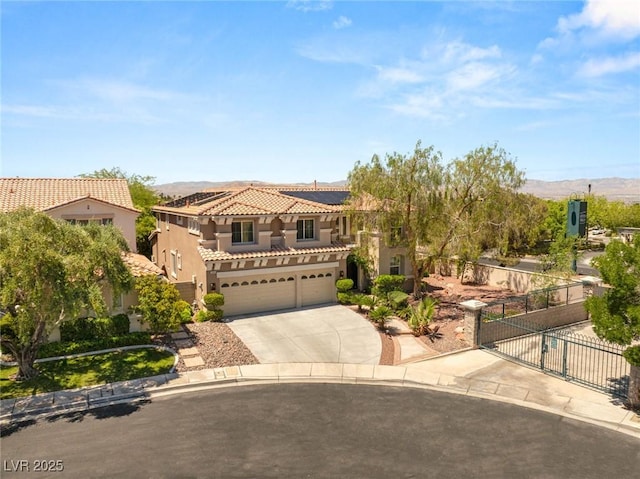 2940 Cimini Ct, Henderson, NV 89052 - mediterranean / spanish-style home featuring stucco siding, fence, driveway, a tile roof, and a garage