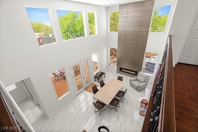 2940 Cimini Ct, Henderson, NV 89052 - living room with a fireplace and marble finish flooring