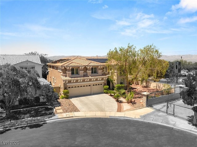 2940 Cimini Ct, Henderson, NV 89052 - mediterranean / spanish home with stucco siding, fence, driveway, a tiled roof, and a gate