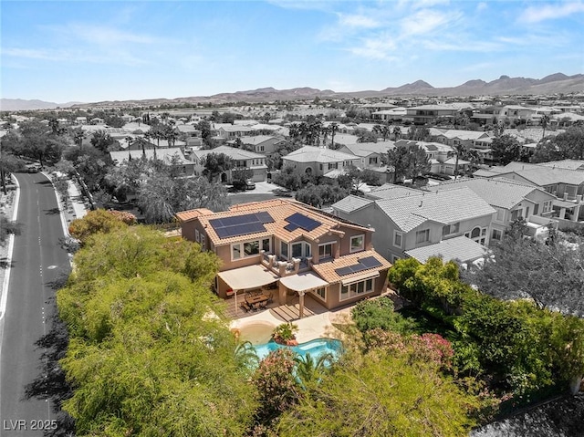 2940 Cimini Ct, Henderson, NV 89052 - aerial perspective of suburban area with a mountain backdrop and a pool area