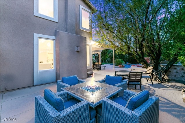 2940 Cimini Ct, Henderson, NV 89052 - view of patio with an outdoor fire pit and outdoor dining space