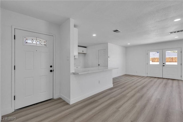 4186 Toronto Cir, Las Vegas, NV 89121 - foyer entrance with light wood-type flooring, recessed lighting, and baseboards