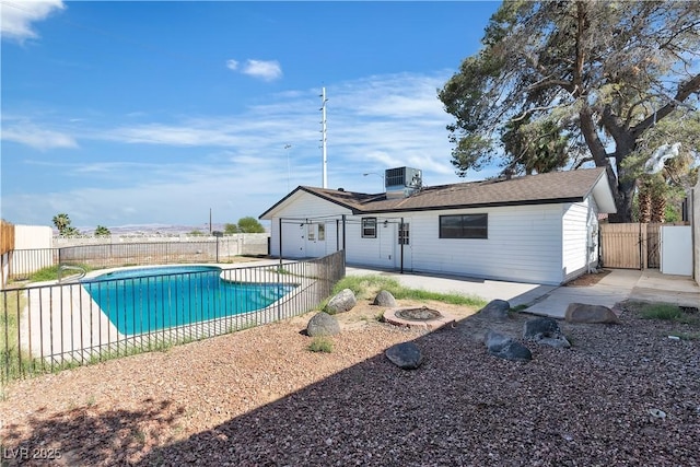 4186 Toronto Cir, Las Vegas, NV 89121 - view of swimming pool featuring a patio, cooling unit, and fence