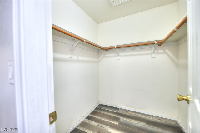 5536 Cleary Ct, Las Vegas, NV 89108 - spacious closet featuring dark wood finished floors
