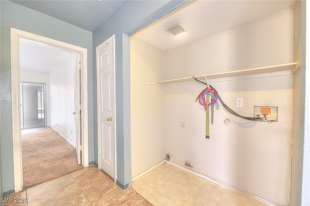 5536 Cleary Ct, Las Vegas, NV 89108 - laundry room featuring baseboards and gas dryer hookup