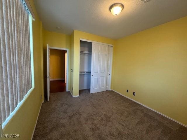 8325 Aspen Village St, Las Vegas, NV 89113 - unfurnished bedroom with carpet floors and a closet