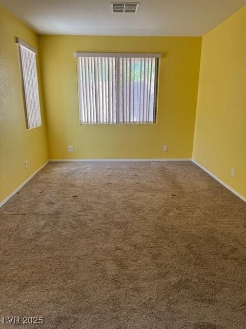 8325 Aspen Village St, Las Vegas, NV 89113 - carpeted spare room featuring baseboards